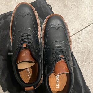 New men’s waterproof winter shoes.  US size 12.  Never worn.